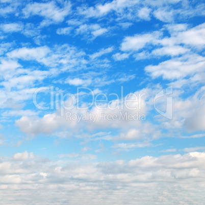 cumulus clouds in the blue sky.