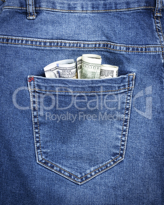 banknotes of the American dollar in the back pocket