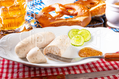 delicious bavarian oktoberfest white sausage with sweet mustard