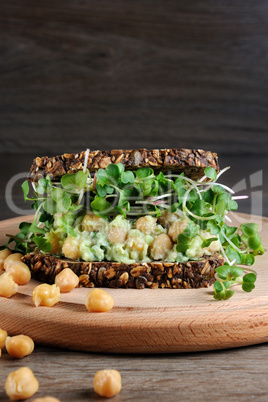 Chickpea Avocado Sandwich with radish sprouts