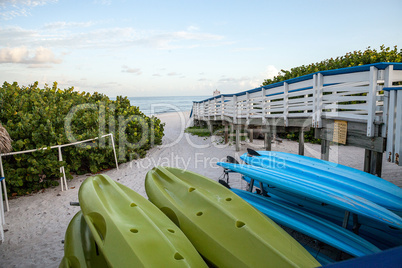 Kayaks along the sand at Clam Pass Beach