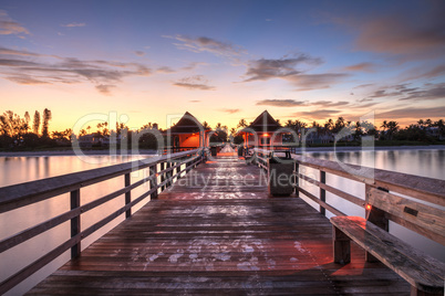 Early sunrise over the Naples Pier on the Gulf Coast of Naples,