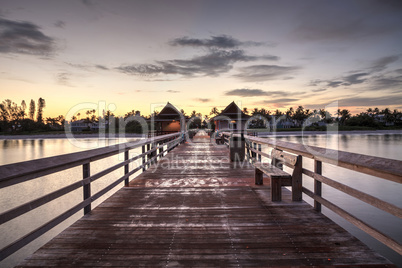 Early sunrise over the Naples Pier on the Gulf Coast of Naples,