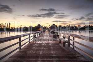 Early sunrise over the Naples Pier on the Gulf Coast of Naples,