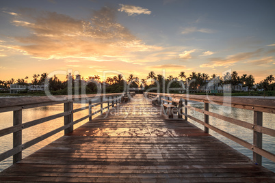 Early sunrise over the Naples Pier on the Gulf Coast of Naples,