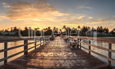 Early sunrise over the Naples Pier on the Gulf Coast of Naples,