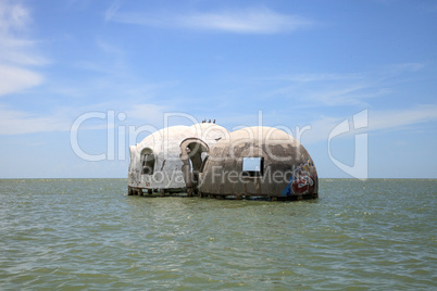 Blue sky over the Cape Romano dome house ruins