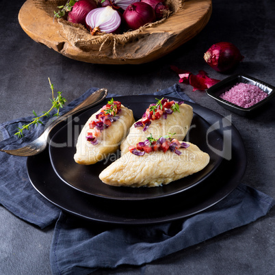 Rustic Cepelinai, a specialty Lithuanian and Polish cuisine.