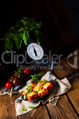 Tomatoes stuffed with rice and cheese from the oven