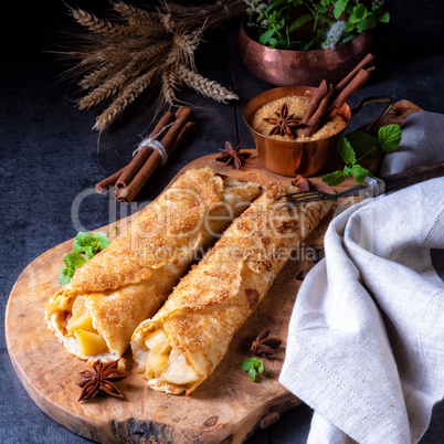 Tasty autumnal omas pancakes with apple and cinnamon