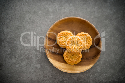 Mid-Autumn Festival Moon cakes on low light background