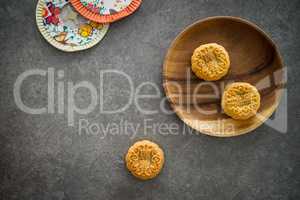 Mid-Autumn Festival Moon cakes with copy space on low light back