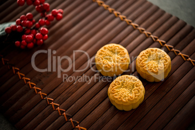Mooncakes on bamboo mat low light