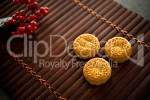 Mooncakes on bamboo mat low light