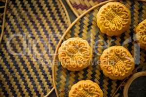 Mooncakes on bamboo background low light
