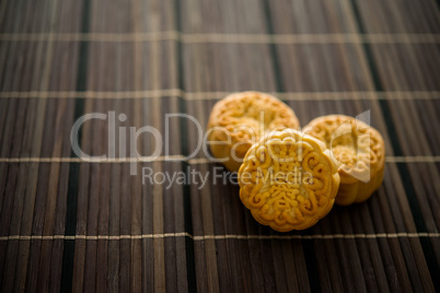 Mooncakes on bamboo mat with copy space