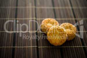 Mooncakes on bamboo mat with copy space