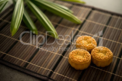 Moon cakes on bamboo mat