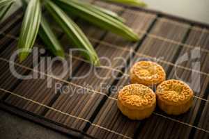 Moon cakes on bamboo mat
