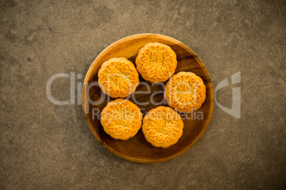 Moon cakes on low light background