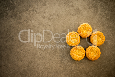 Mooncakes on dark background with copy space
