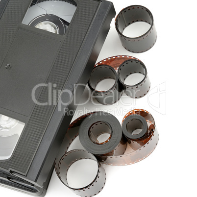 A set of video tapes and photographic film isolated on white bac