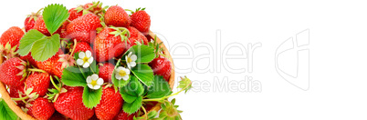 Appetizing strawberries in a wicker basket isolated on white bac
