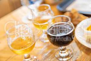 Abstract of Small Glass of Micro Brew Beers On Bar