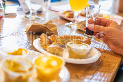 Woman Enjoys Warm Pretzels and Micro Brew Beer