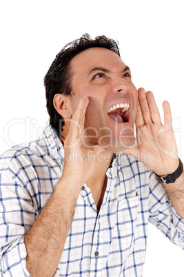 Caucasian man shouting with hands on mouth