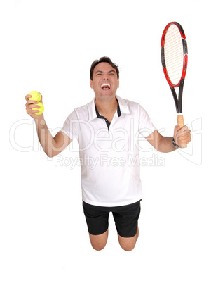 Tennis man kneeling on floor in victory