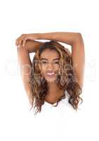 Beautiful happy young woman with arms on head