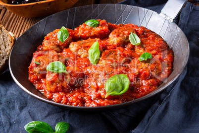 Rustic mini meatballs Baked in tomato sauce with basil