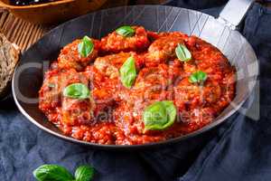 Rustic mini meatballs Baked in tomato sauce with basil