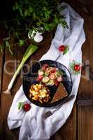 fresh chanterelles with scrambled eggs and a green salad