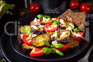 Eggplant grilled with aromatic feta cheese and tomatoes