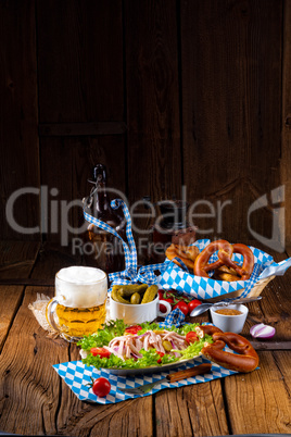 delicious bavarian sausage salad with onion and cucumbers