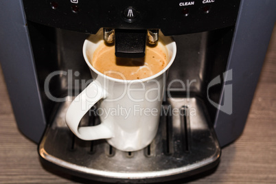 Coffee machine with a cup of coffee