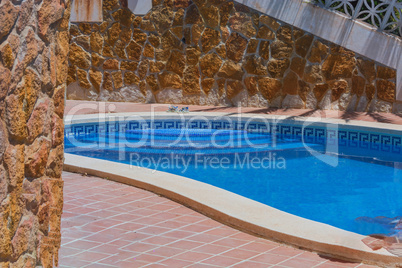 Swimming pool with blue water to relax.