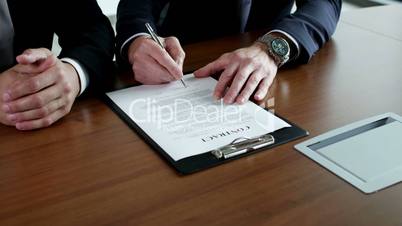 business men signing a contract