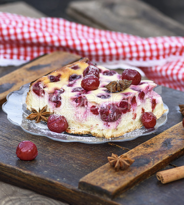piece of cottage cheese pie and canned cherries