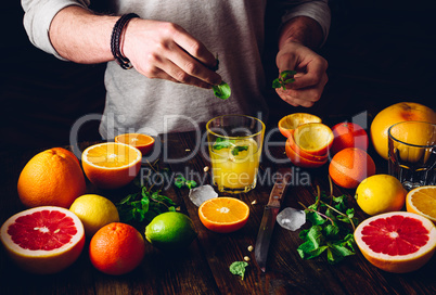 Guy Prepare the Citrus Cocktail.