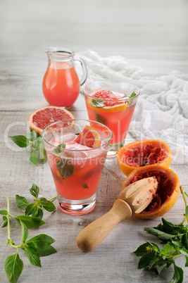 Cocktail of grapefruit and lemon basil