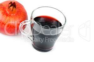 Glass of pomegranate juice with fruit isolated on white. Healthy