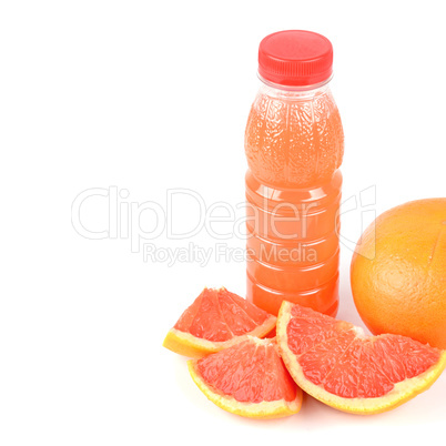 A fruits of grapefruit and a bottle with juice isolated on white