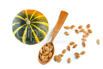Seeds and pumpkin fruits isolated on white background. top view