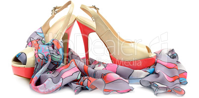 Elegant sandals and scarf isolated on white . Wide photo.