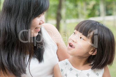 Mother and daughter at park