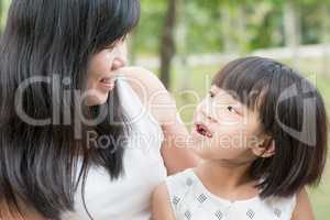 Mother and daughter at park