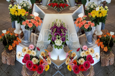 Various flowers arranged in vases
